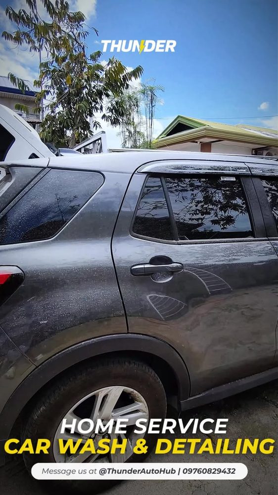 Exterior hand car wash in progress